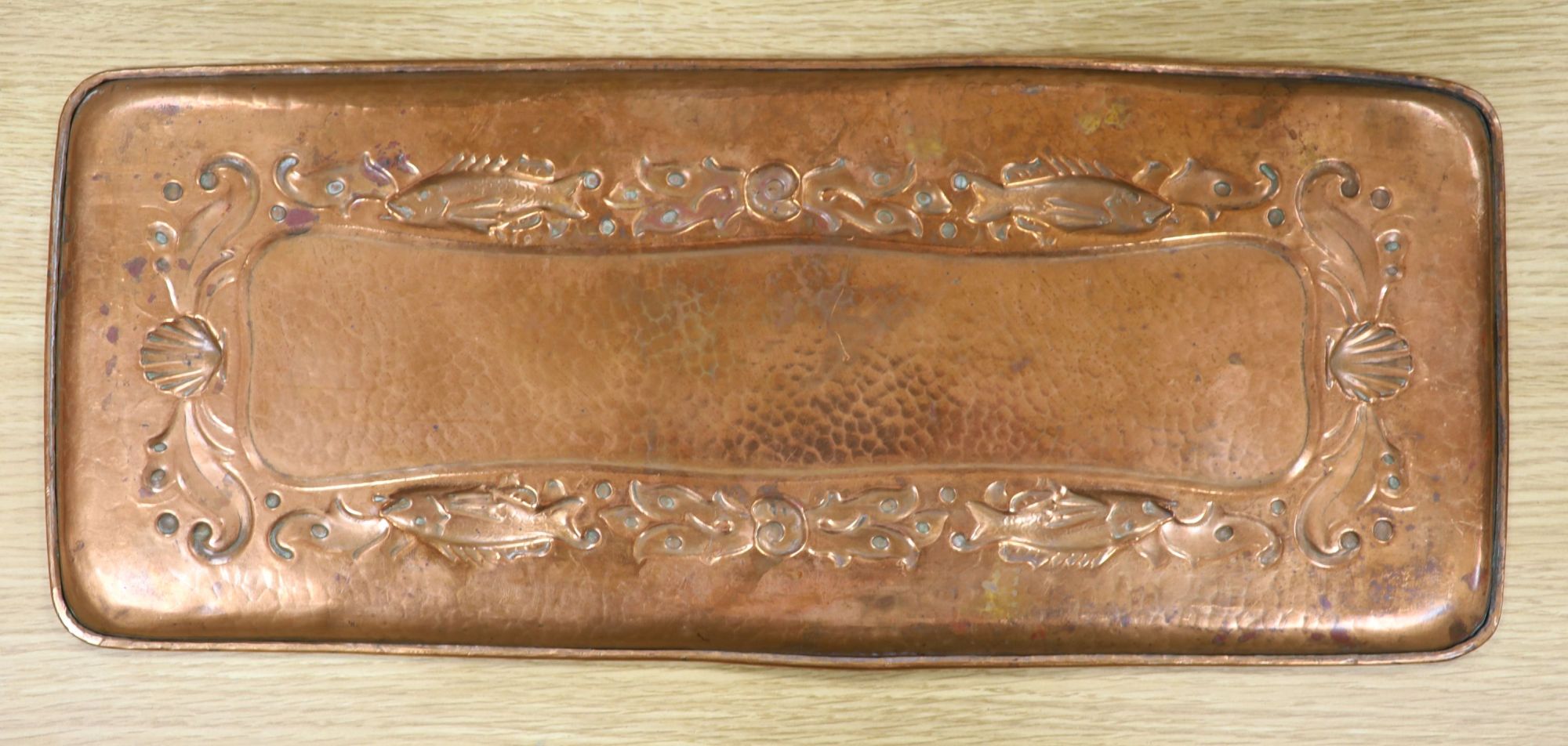 A Newlyn copper tray, stamped mark, 47 x 19.5cm